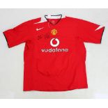 OLE GUNNAR SOLKSJAER; a signed replica Manchester United football shirt.