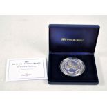 A 2006 Year of the Three Kings 70th Anniversary 5oz .999 silver proof coin, no. 135/950,
