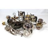 A quantity of electroplated items including teapot, knife rests, mixed flatware, jugs, etc.