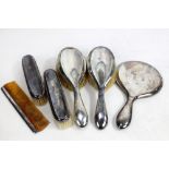 HENRY MATTHEWS; a George V hallmarked silver backed six piece dressing table set comprising a