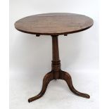 A Georgian oak tilt top occasional table, diameter 65cm.