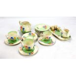 CLARICE CLIFF; a group of Royal Staffordshire 'Spring' and 'Crocus' pattern decorated tea ware