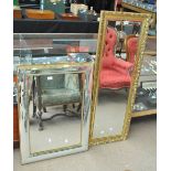 A modern gilt framed rectangular mirror, length 126cm, and a further example (2).