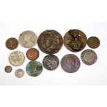 A small group of coins including Elizabeth I 1575 sixpence, Charles II twopence, George III 1817