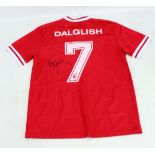 SIR KENNY DALGLISH; a signed replica 1984 Liverpool football shirt.