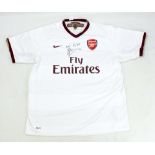 DENNIS BERGKAMP; a signed replica Arsenal football shirt.
