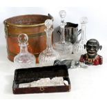 A small mixed lot including four clear glass decanters, money box, copper swing handled barrel, etc.