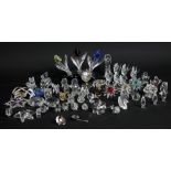 SVAROVSKI; a collection of miniature crystal ornaments including figurines, flowers, Christmas