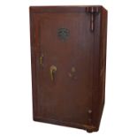 A large steel safe with applied crest to front 'Withygrove Stores Ltd Bent Steel Safe Manchester',