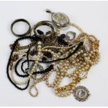 A small mixed lot of costume jewellery to include a 925 stamped silver and amethyst coloured glass