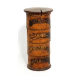 A Victorian four tier cylindrical spice tower; 'Mace', 'Cloves', 'Cinnamon', and 'Nutmegs', height