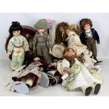 Twelve modern porcelain dolls including Alberon examples and one housed in carry case, all in