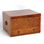 A 19th century bird's eye maple sewing box containing various accoutrements and with drawer to base,