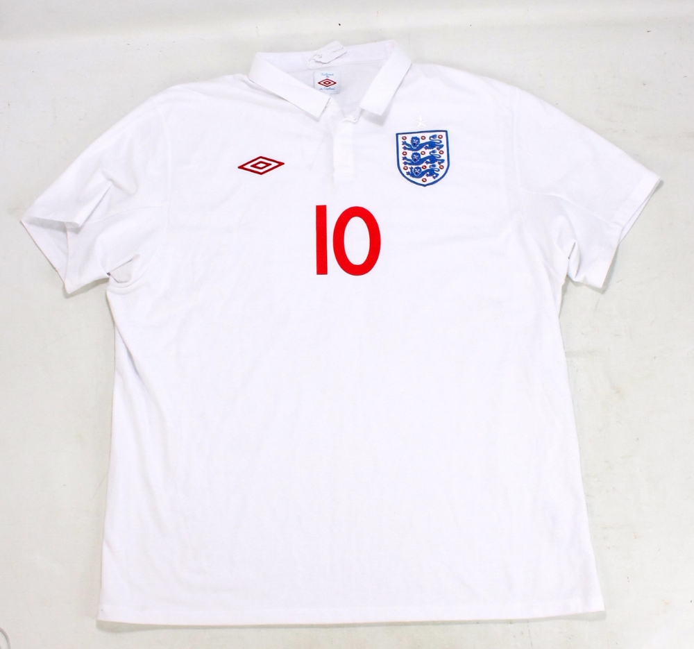 WAYNE ROONEY; a signed replica England home shirt.