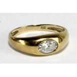 A yellow metal dress ring set with a non precious white stone, stamped '375' to band interior,