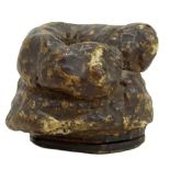 A Victorian lacquered papier-mâché snuff box modelled as animal faeces, with hinged lid, length