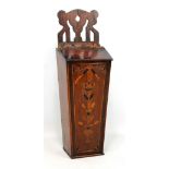 A George III mahogany and inlaid candle box of tapering rectangular form with pierced upper