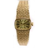 ROTARY; a 1970s 9ct yellow gold mechanical lady's wristwatch, the rounded rectangular dial set