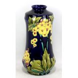 MINTON; a circa 1900 Secessionist waisted vase with tubelined floral decoration on dark blue ground,