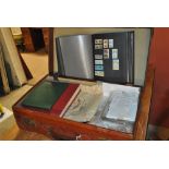 WORLD STAMPS; in old leather suitcase, much Great Britain and Commonwealth in albums, 1981 wedding