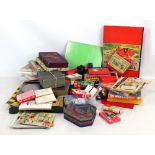 A group of vintage board games including Careers, Scoop!, Railway Riot, Monopoly, Tell Me Quiz