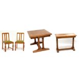 A 20th century oak dining suite comprising extending dining table, raised on stretchered fluted