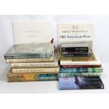 A group of art books with subjects including the Impressionists, Old American West, Van Gogh, Van