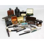 A mixed lot of collectors' items including various pen knives, five fountain pens to include Swan