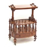 A good Victorian walnut and burr walnut Canterbury whatnot of shaped outline with single drawer on
