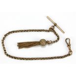 A 9ct yellow gold pocket watch fob chain suspending a T-bar and a tassel, both unmarked, length
