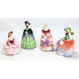 Four Royal Doulton figures: HN1452 'A Victorian Lady', HN1622 'Evelyn', HN1911 'Autumn Breezes'