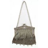 A circa 1900 German Secessionist white metal evening mesh purse decorated with a scarab motif,