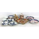 A group of 18th century English porcelain comprising two saucers painted with chinoiserie figural
