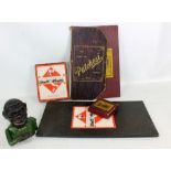 A 'Jolly' money bank, an early 20th century Monopoly set, a 'Sorry' set and a 'Patchesi' board (4).