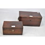 A Regency mahogany and line inlaid twin handled tea caddy, with fitted interior (lacking bowl),