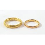 Two 22ct yellow gold bands, one with bright cut decoration, the larger size P, combined approx 10.0g