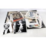 A quantity of unframed ephemera relating to film stars and ballet including prints, reproduced