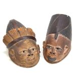 A pair of African wooden tribal masks (2). Additional InformationWear throughout, some chips,