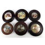 Two pot lids featuring bears (one af), another featuring wolf and ram titled 'The Snow Drift', a