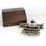 An oak cased Blickensderfer feather weight typewriter purported to have belonged to Clement Attley's