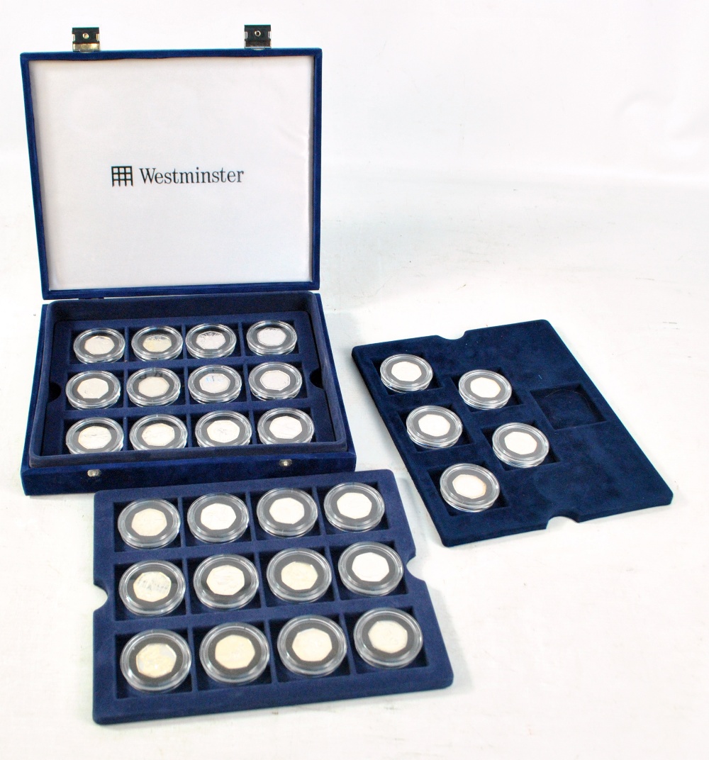 A London Olympics 50p twenty-nine coin set, lacking completer medallion and without certificates,