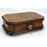 A hexagonal walnut and burr walnut box with single drawer on four feet.Additional InformationGeneral