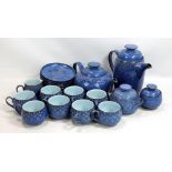 DENBY; a 'Midnight' pattern eight setting tea service comprising cups and saucers, a teapot, a