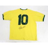 PELÉ; a signed replica Brazil 1970 football shirt.