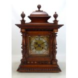 A late 19th century walnut eight day bracket clock, the rectangular brass face with silvered