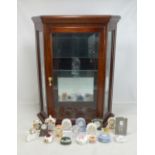 A collection of miniature predominantly ceramic mantel clocks including Royal Crown Derby and