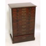 A circa 1900 stained pine collector's chest of ten graduated drawers to a plinth base, width 56cm.