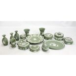 WEDGWOOD; a group of green jasperware including vases, trinket boxes, etc.