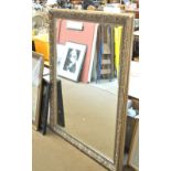 A rectangular gilt framed mirror with bevelled glass, 141 x 110cm.