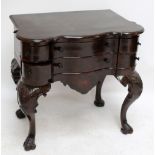 An early 20th century Continental walnut serpentine fronted side table, the marquetry and chevron
